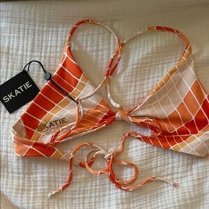 Skatie Vibrant Orange and Cream Bikini Top